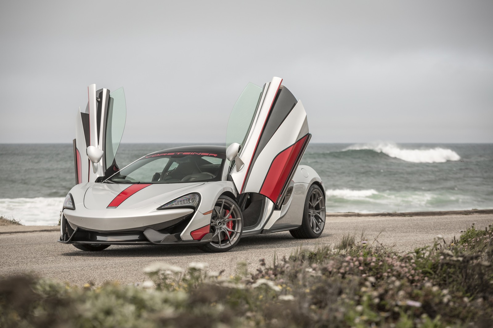 A white and red sports car parked on the side of the road (mclaren 570s, mclaren, car, sports car, mclaren automotive)