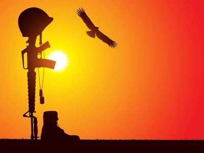 Silhouette eines Militärtributs bei Sonnenuntergang