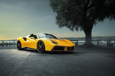 Ferrari 488 Spider amarillo estacionado elegantemente bajo un árbol, mostrando líneas elegantes y un diseño impresionante contra un fondo sereno.