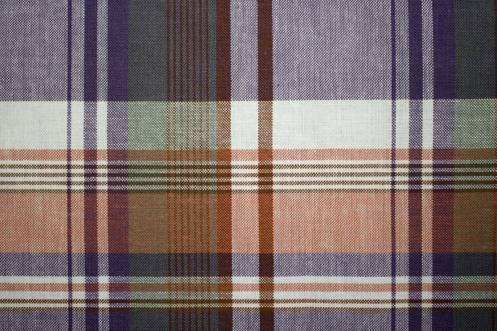 A close up of a plaid fabric with a brown and blue pattern (tartan, texture, textile, design, plaid)