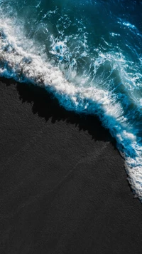 Majestic Ocean Waves Meeting Sandy Shore