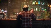 Wolverine en un bar iluminado con neón: una escena de videojuego