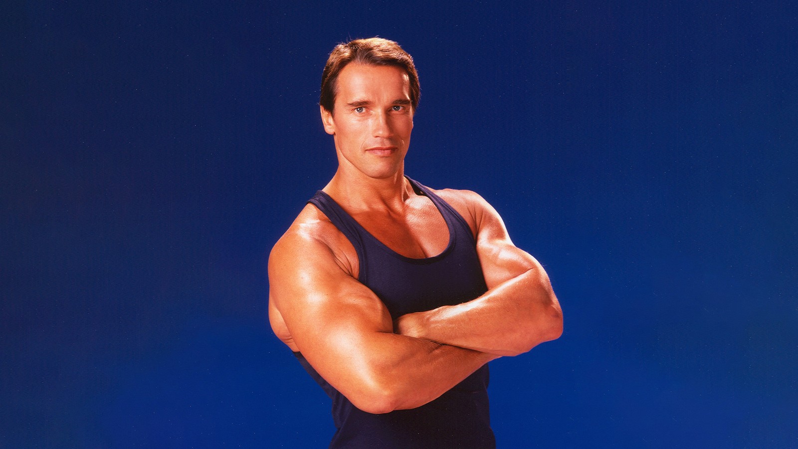 A close up of a man in a tank top posing for a picture (arnold schwarzenegger, portrait, bodybuilder, american actor, 5k)