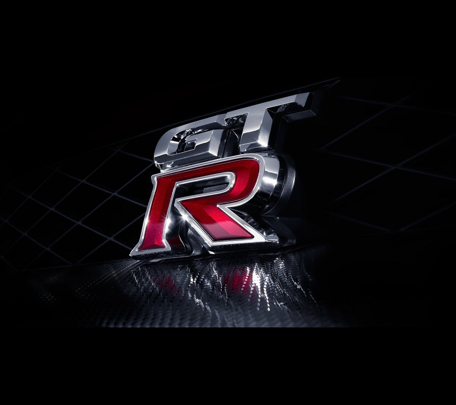 Um close de um logotipo vermelho e preto em um fundo preto (carro, gtr)