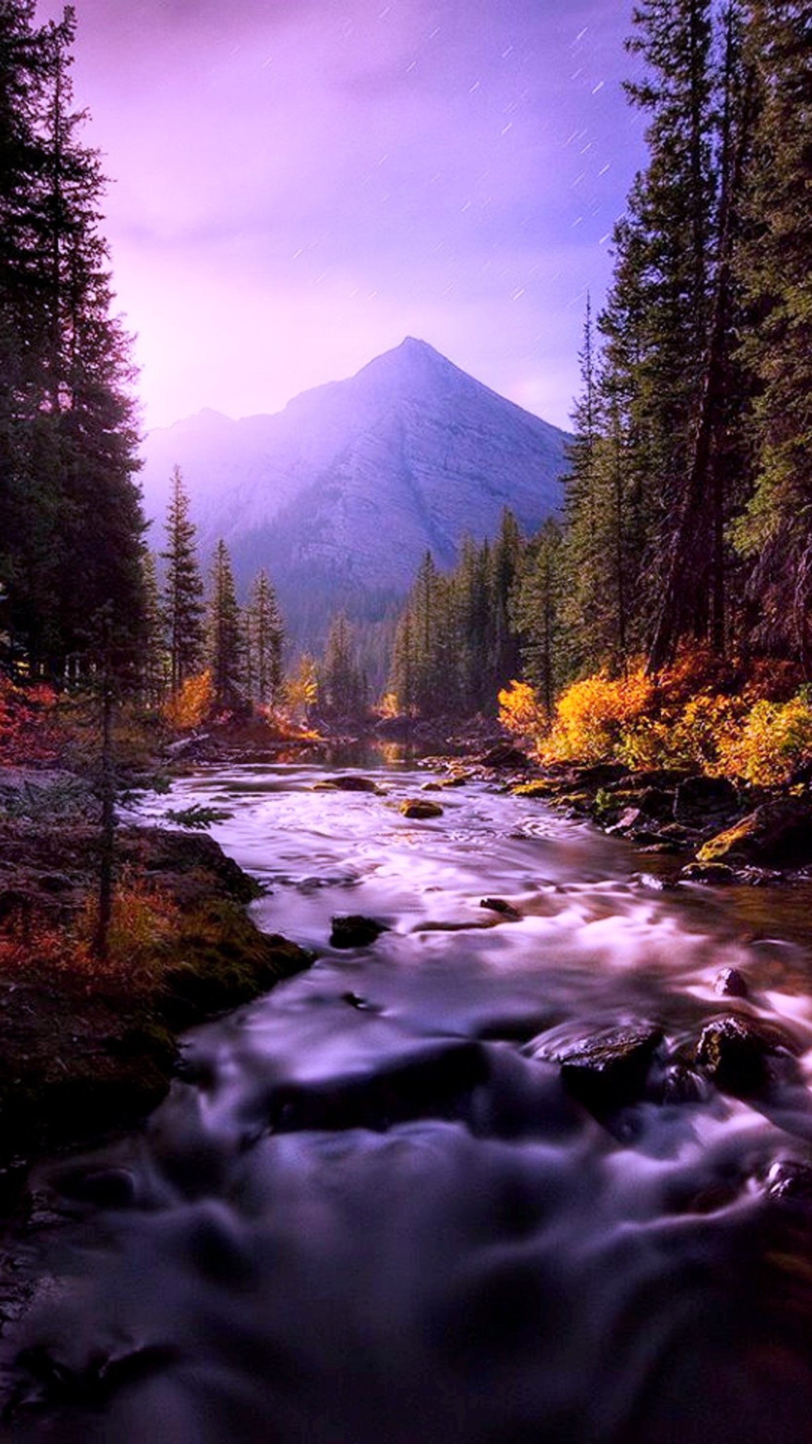 Mountains in the distance with a river running through it (mountain, nature, river, sky)