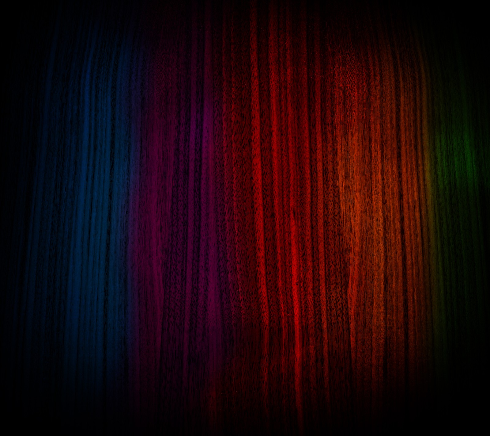 A close up of a rainbow colored curtain with a black background (colors, dark, goth, music, rainbow)