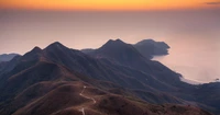 Serene Dawn Over Victoria Peak: Mountain Ridge and Horizon