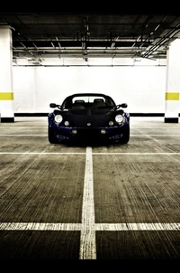 Sleek Blue Sports Car Parked in an Empty Garage