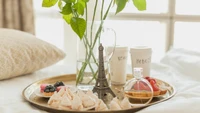 Elegant Breakfast Tray with Treats and Fresh Flowers