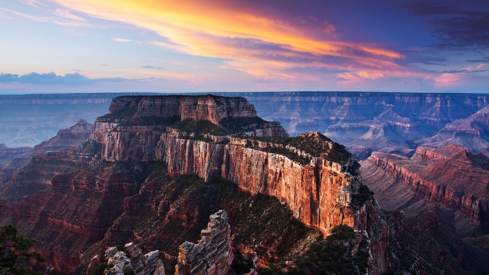 A view of the grand canyon at sunset from the rim of the grand canyon (grand canyon village, national park, canyon, formation, rock)