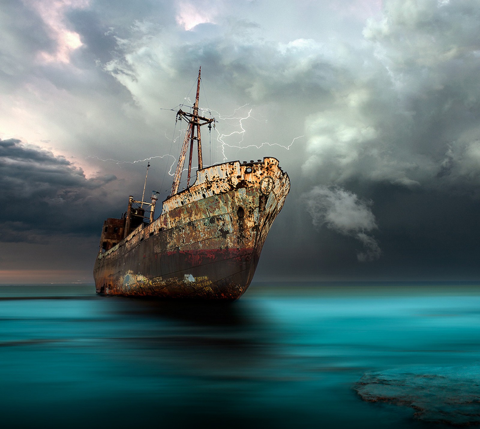 Arafed ship in the ocean with lightning coming out of it (a dead ship, rusty, sea)