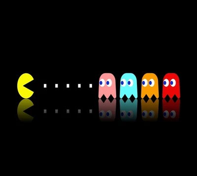 Pac-Man poursuivant des fantômes colorés dans un cadre sombre