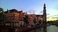 Evening Reflection on a Medieval Canal in a Historic Town