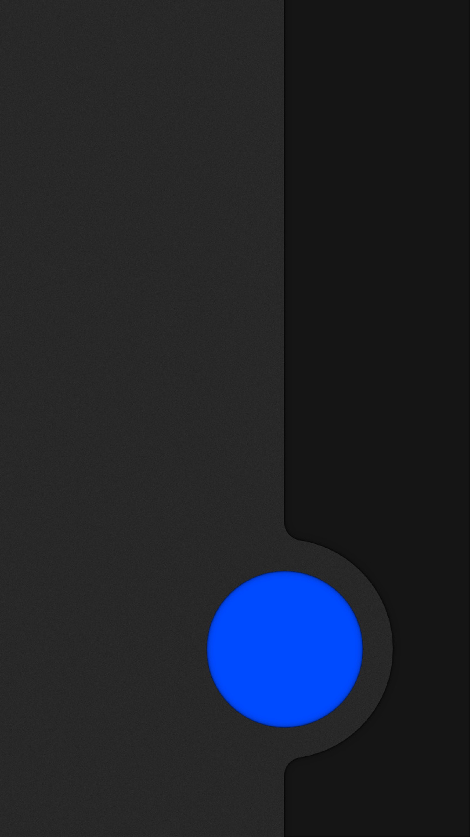 A close up of a cell phone with a blue button (abstract, black, blue, button, circle)