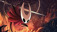 Рогатка из Hollow Knight: Silksong в динамичной позе, готовая к действию в огненной, стилизованной среде.