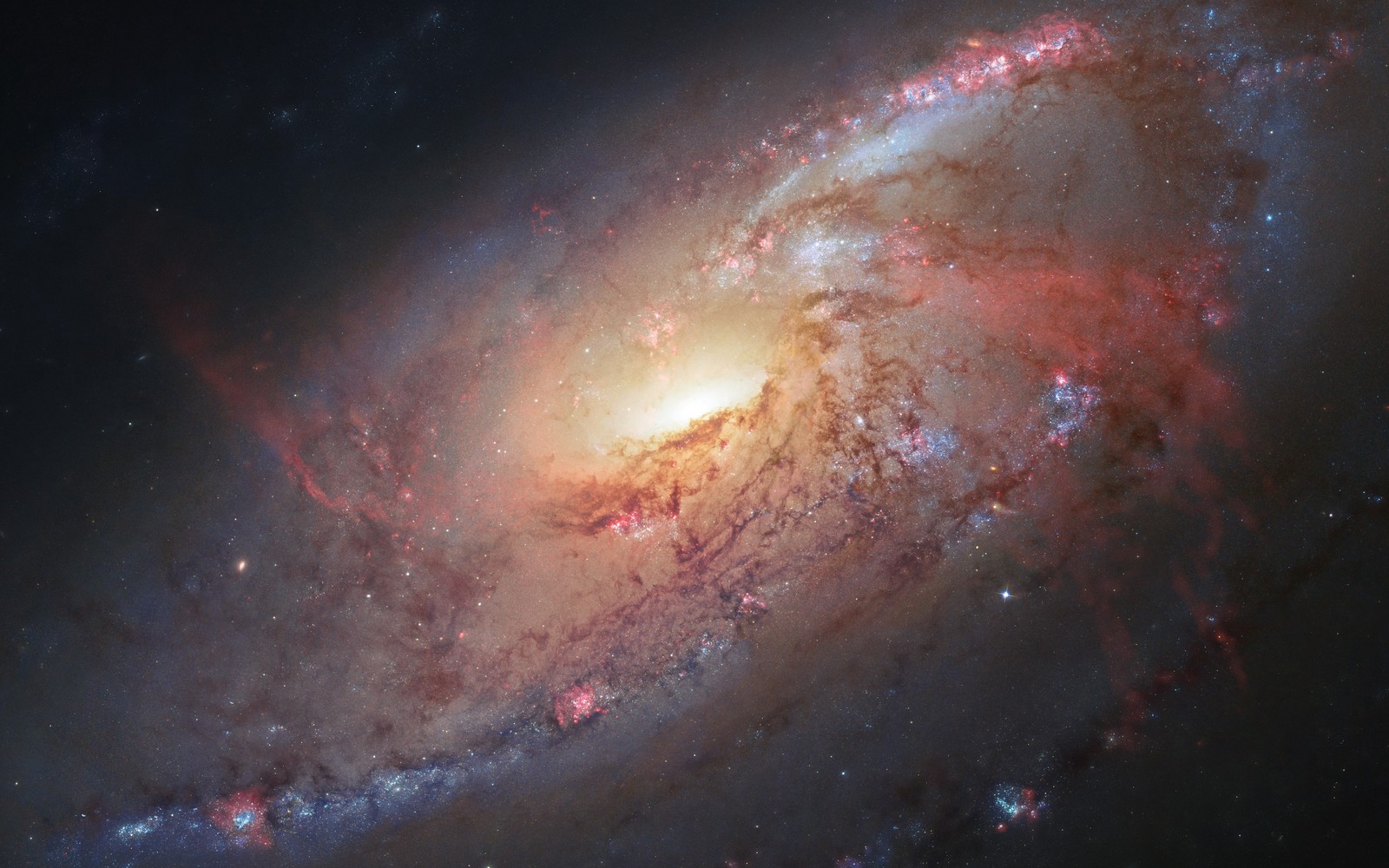 Un primer plano de una galaxia espiral con una luz brillante atravesándola (galaxia espiral, messier 106, constelación, nebulosa, estrellas)