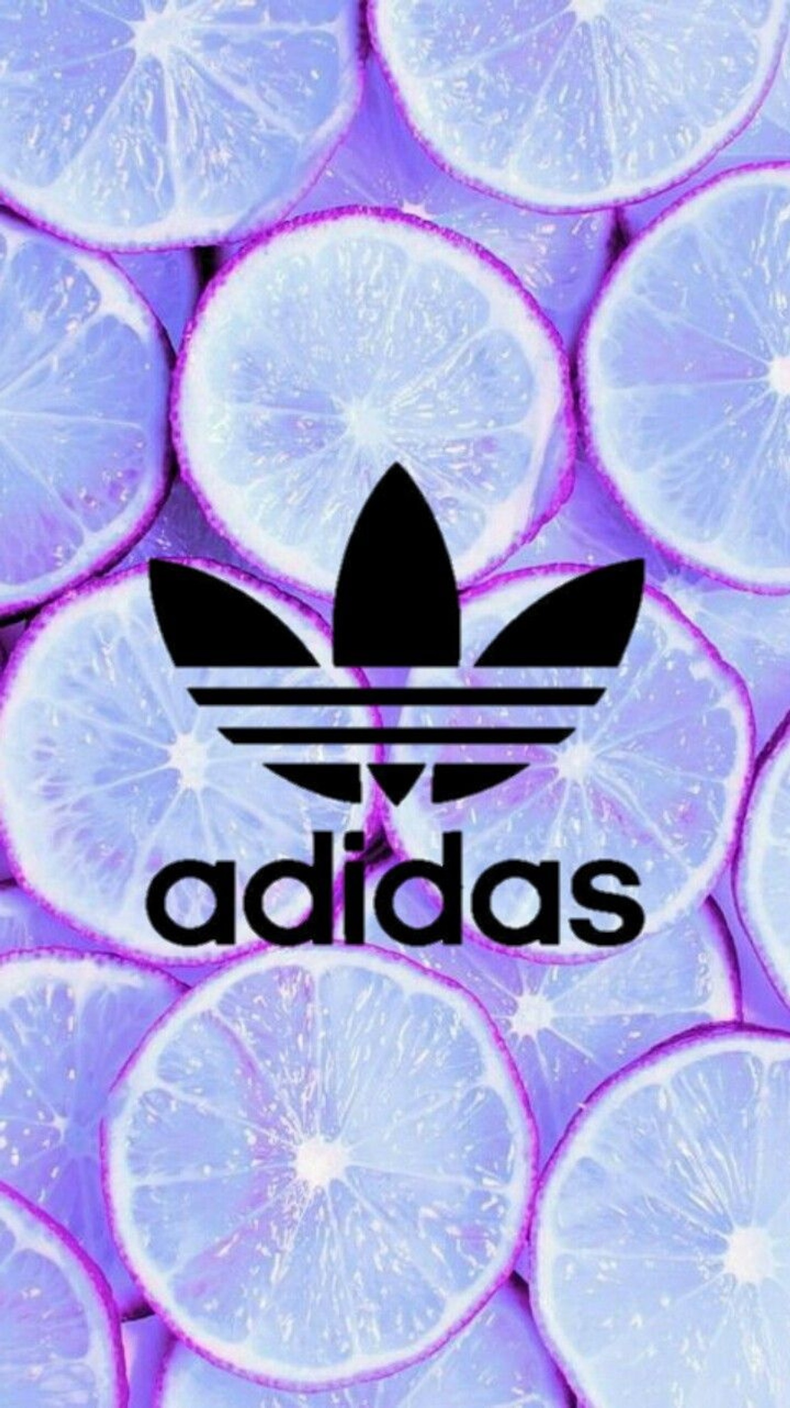 Un primer plano de un montón de rodajas de limón con un logo de adidas (rosa, tumblr)