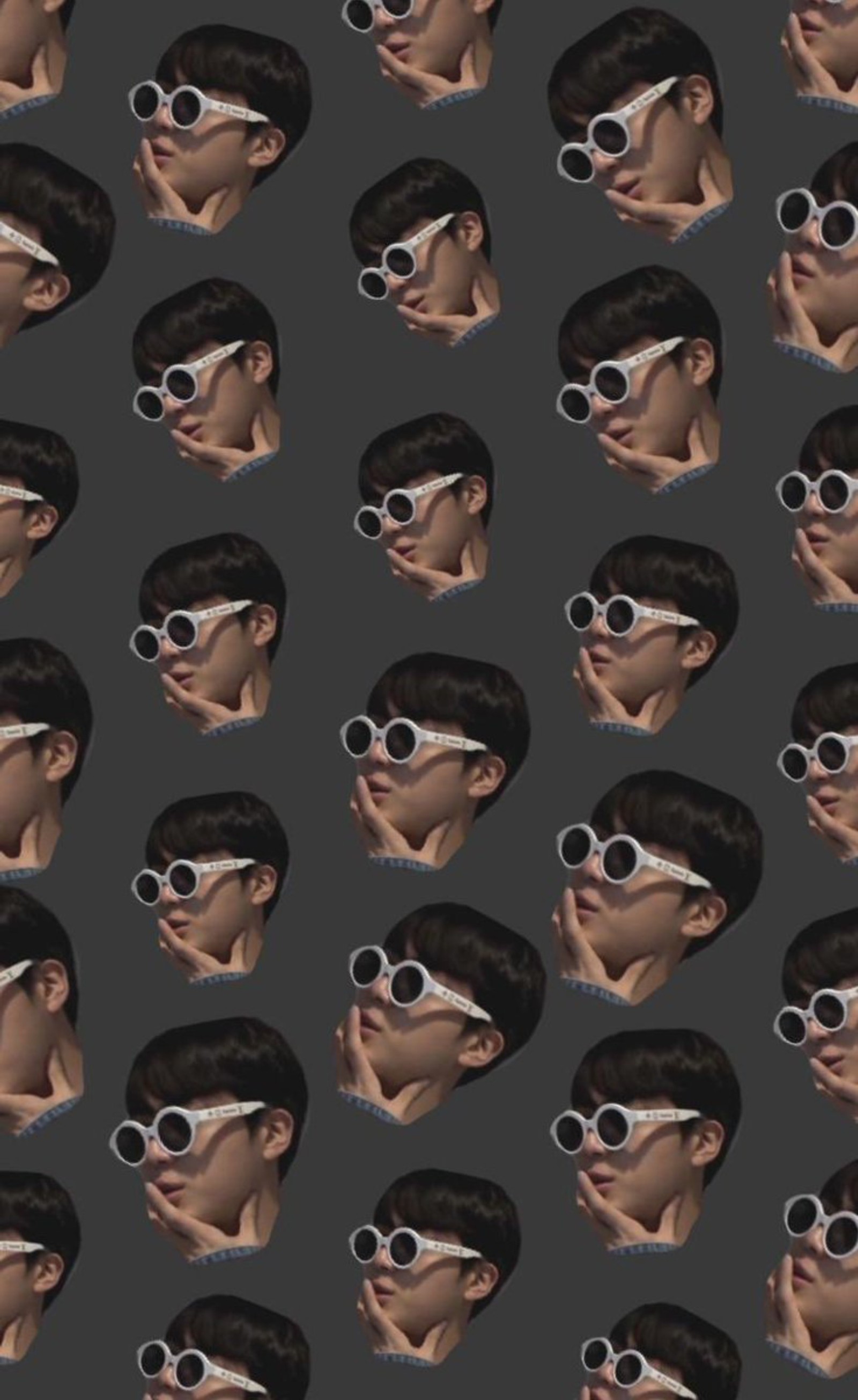 Gros plan d'une personne portant des lunettes avec de nombreux visages différents (mignon, bts, jin, drôle)