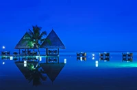 Tranquil Blue Reflection of a Tropical Resort at Dusk