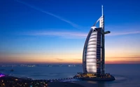 Burj Al Arab Jumeirah: Ein Luxuriöser Wolkenkratzer Mit Blick Auf Ruhige Gewässer