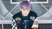 Mark Lee from SuperM in a stylish outfit with purple hair, exuding a confident and charismatic aura.