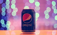 Lata de Pepsi refrescante contra um fundo bokeh colorido