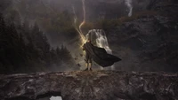 Black Adam stands dramatically on a rocky ledge, surrounded by a misty landscape with a waterfall and dark, stormy skies, wielding lightning in a powerful pose.