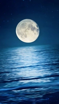 Illuminated Blue Ocean Beneath a Full Moon