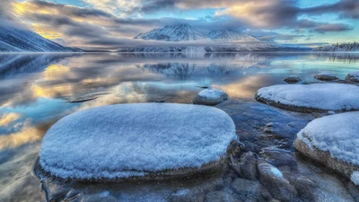 Serene Kathleen Lake: Snow-Capped Mountains Reflecting in Tranquil Waters