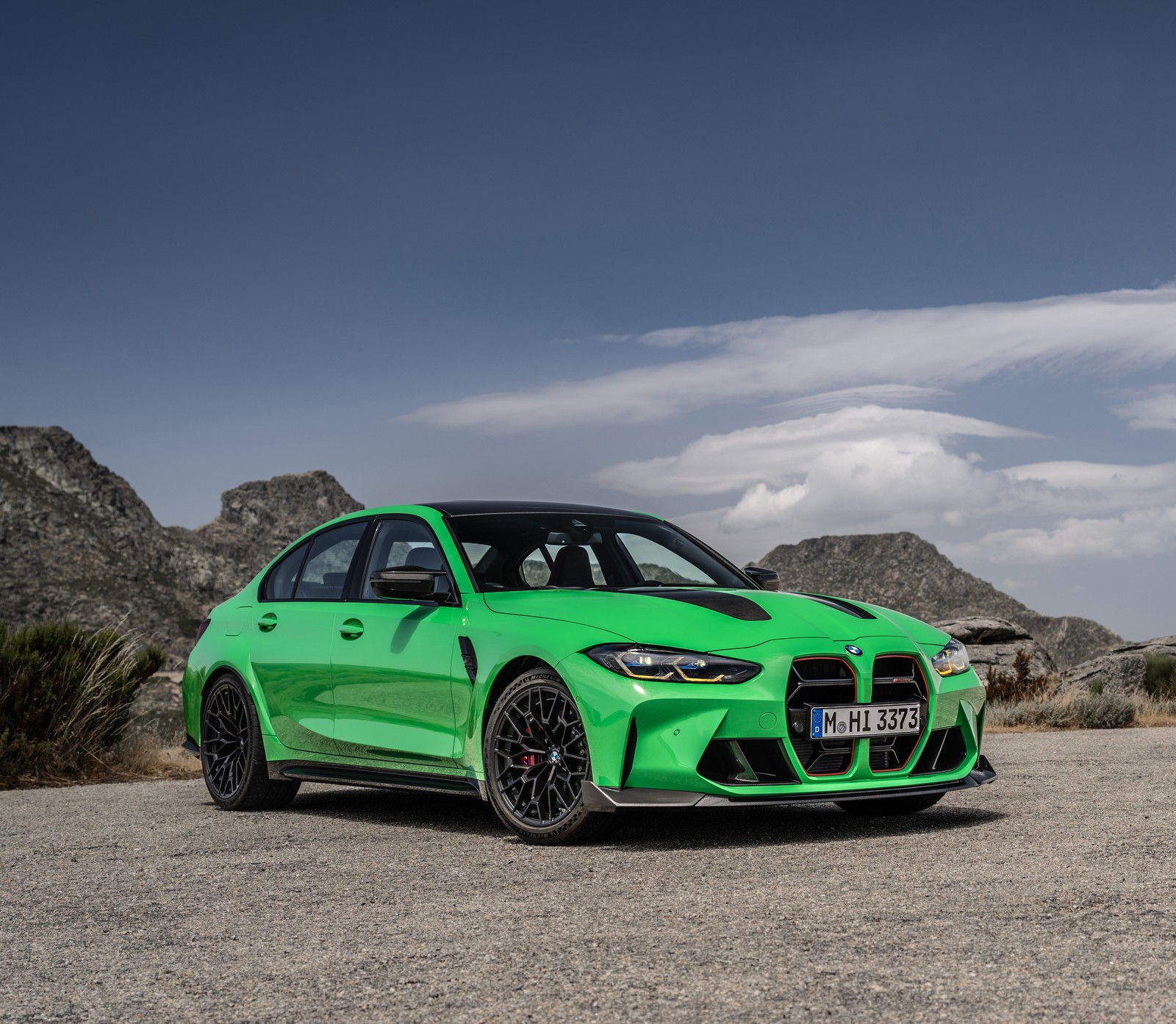 A green bmw m140i parked in front of a mountain (bmw m3 cs, sports sedan, 5k, 2023, cars)