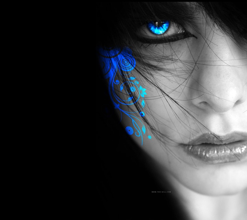 A close up of a woman with blue eyes and a black background (black, wallpaper)