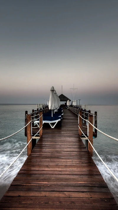 Serene Wooden Pier Overlooking Calm Waters at Dusk