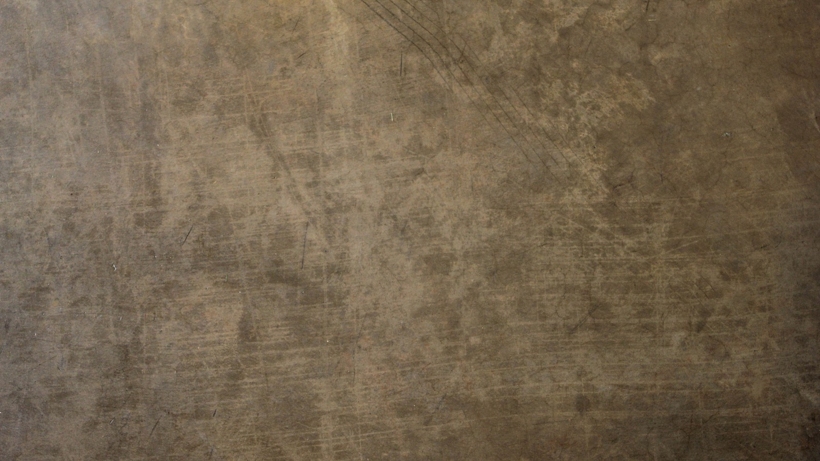 Arafed concrete surface with a rough surface and a rough surface (texture, floor, brown, wall, flooring)