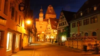 Charming Nighttime Scene of a Historic Town Square