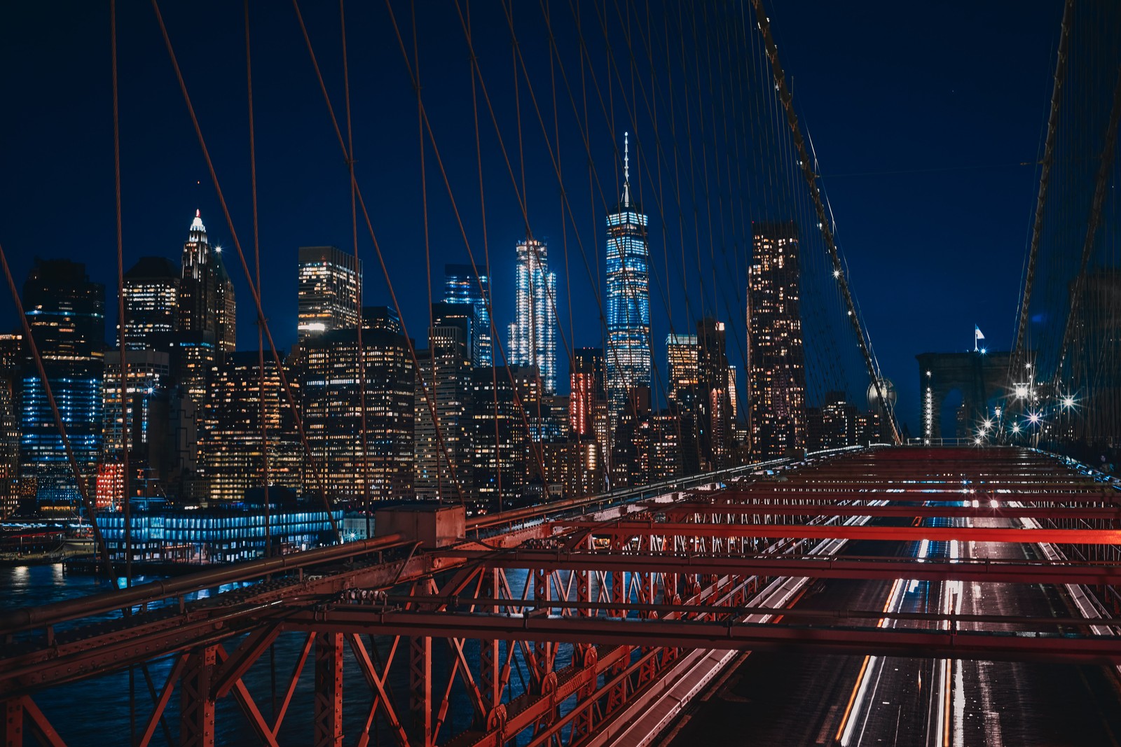 A view of the city skyline from the brooklyn bridge at night (brooklyn bridge, 5k, manhattan, new york city, cityscape)