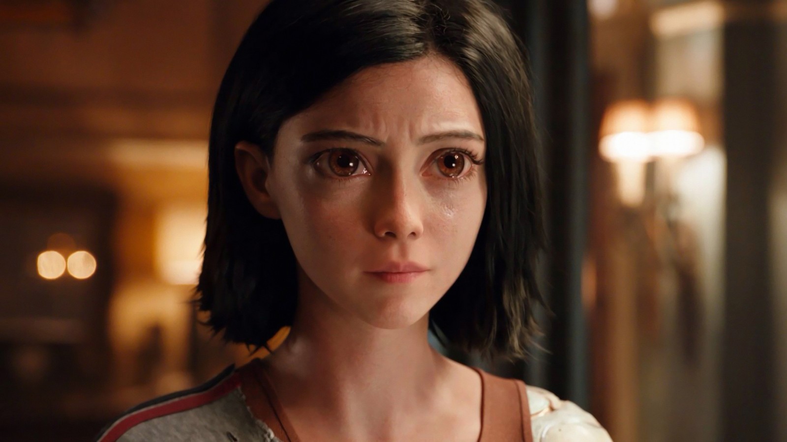 Une femme avec un collier et un pendentif autour du cou. (alita battle angel, film)