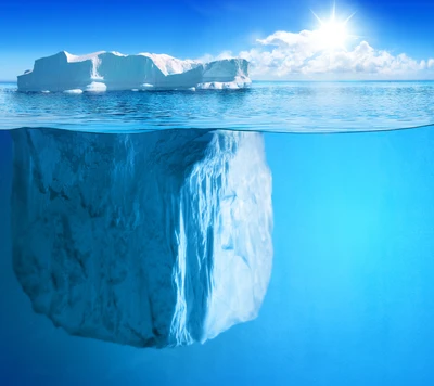 Majestic Iceberg Glimmering Under a Clear Winter Sky