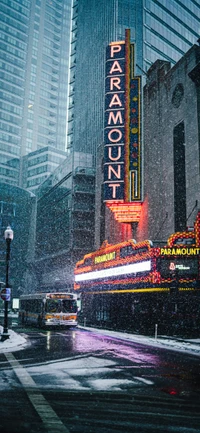 Paramount Theatre in a Snowy Urban Cityscape