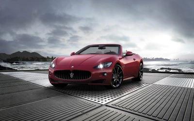 Maserati Granturismo Кабриолет на драматичном прибрежном фоне