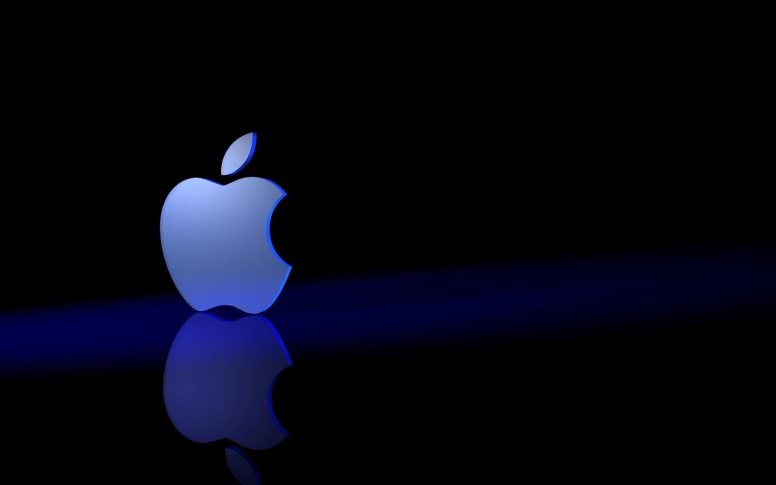 Ein apple-logo wird im dunkeln mit blauem licht gezeigt (apfel, licht, dunkelheit, graphiken, macbook pro)