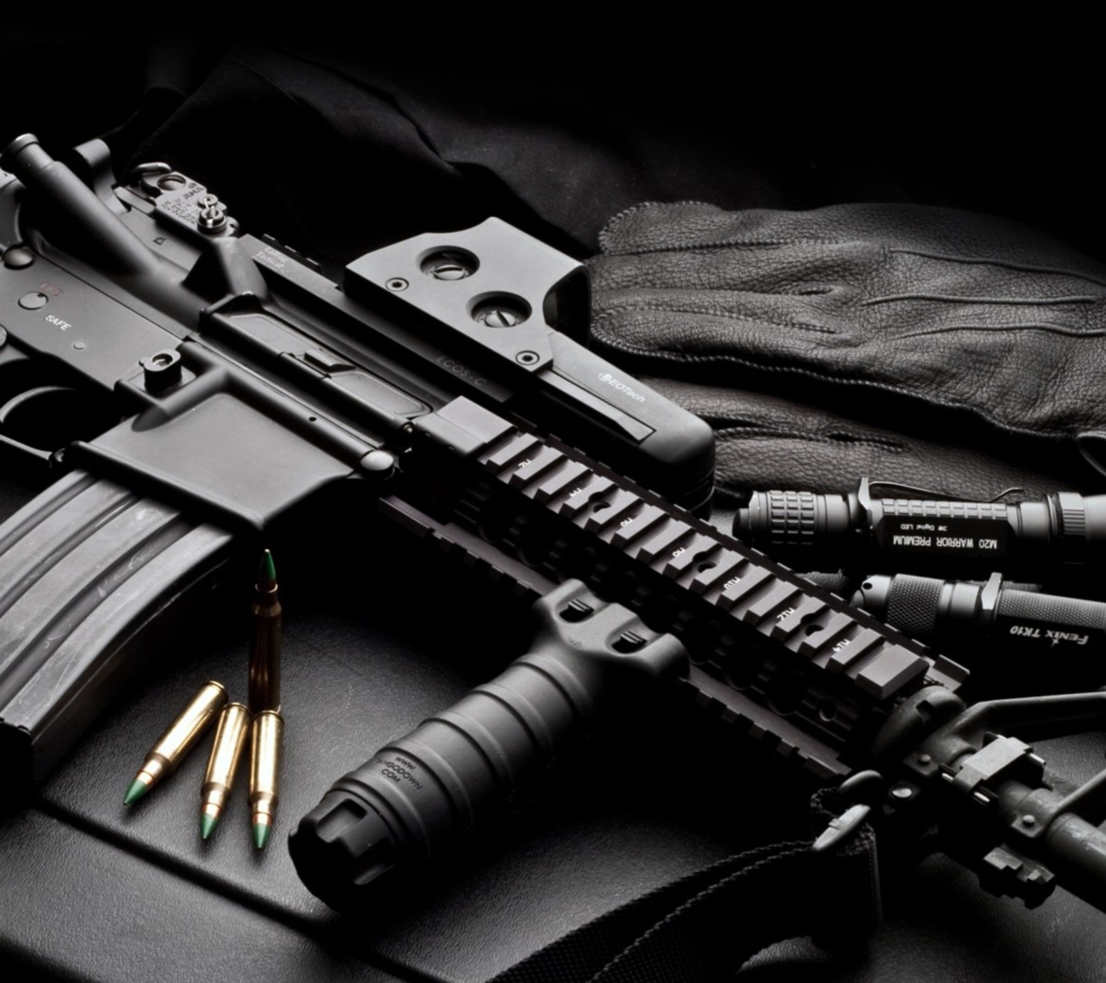 A close up of a gun and a bullet on a black surface (army, bullet, counter, cs, m4a1)