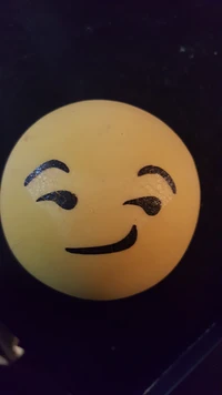 Smirking Emoji Ball: A Playful Expression of Mischief