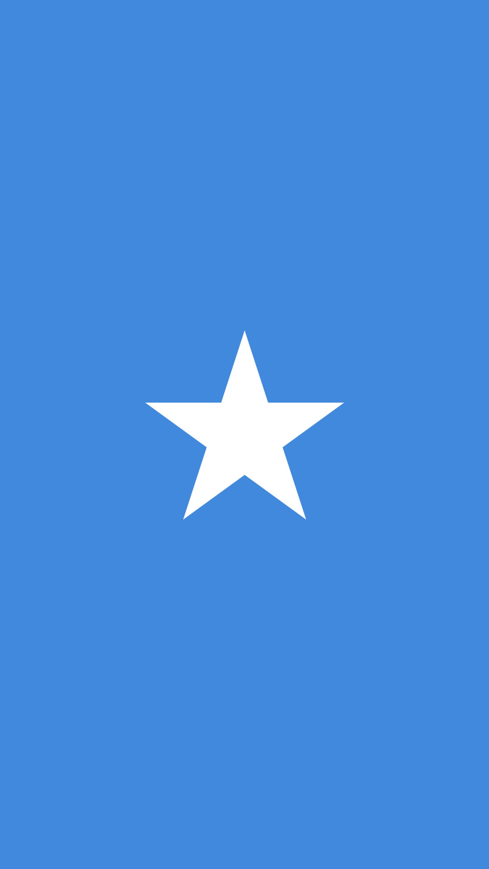 A close up of a white star on a blue background (blue, flag, somalia, star)