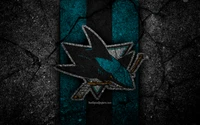 Turquoise and teal graphic design featuring a distressed logo of the San Jose Sharks against a dark, cracked background.