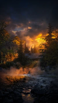 Enchanting Afterglow Over a Misty Forest Stream