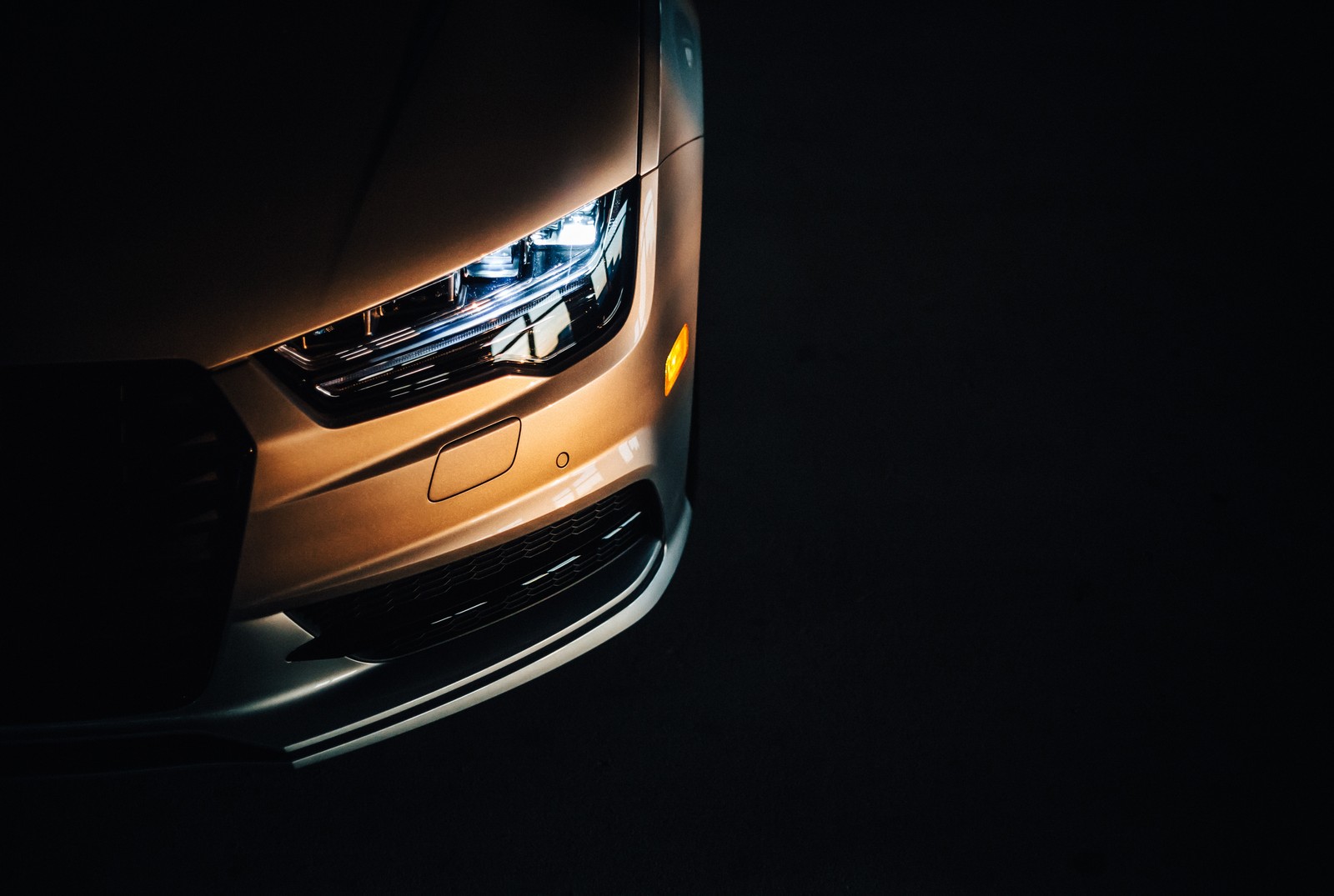 A close up of a car's headlights in the dark (car, audi s6, audi, sports car, audi a6)