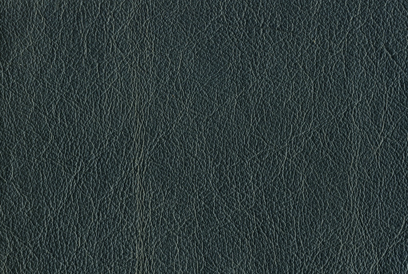 A close up of a black leather surface with a small amount of scratches (atmosphere, black, blue, leather, texture)