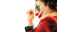 Joaquin Phoenix as the Joker in a striking cinematic portrait.