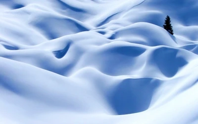 Tranquil Arctic Landscape of Electric Blue Snow Waves