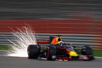 Coche de Fórmula Uno de Red Bull Racing lanzando chispas en la pista